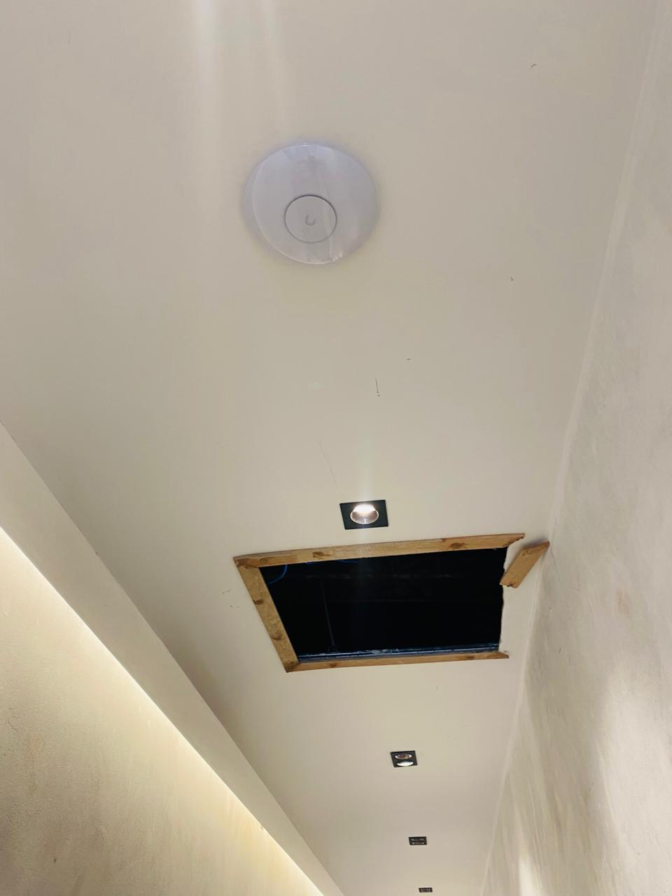 Global IT Systems ceiling-mounted wireless access point installation
